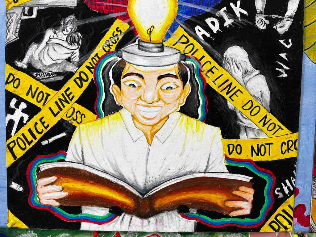 An illustration shows the transition from the war on drugs to a more enlightened approach to the treatment of drug problems.